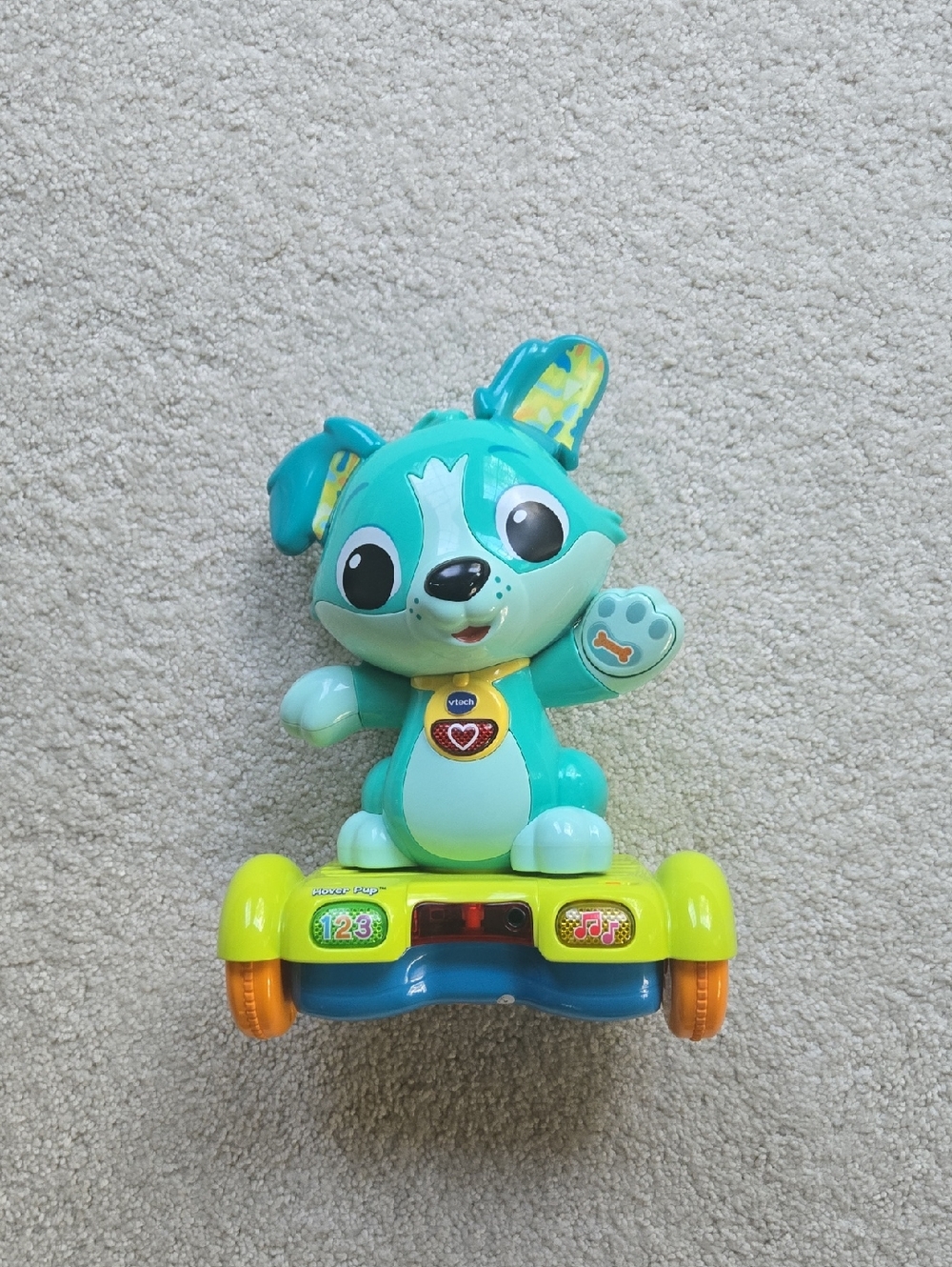Teal Interactive Puppy Toy with Music and Buttons
